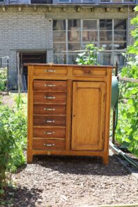Chest of drawers with many drawers made of fir